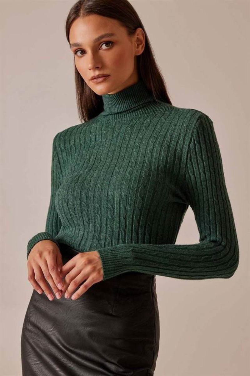 Cable-knitted sweater